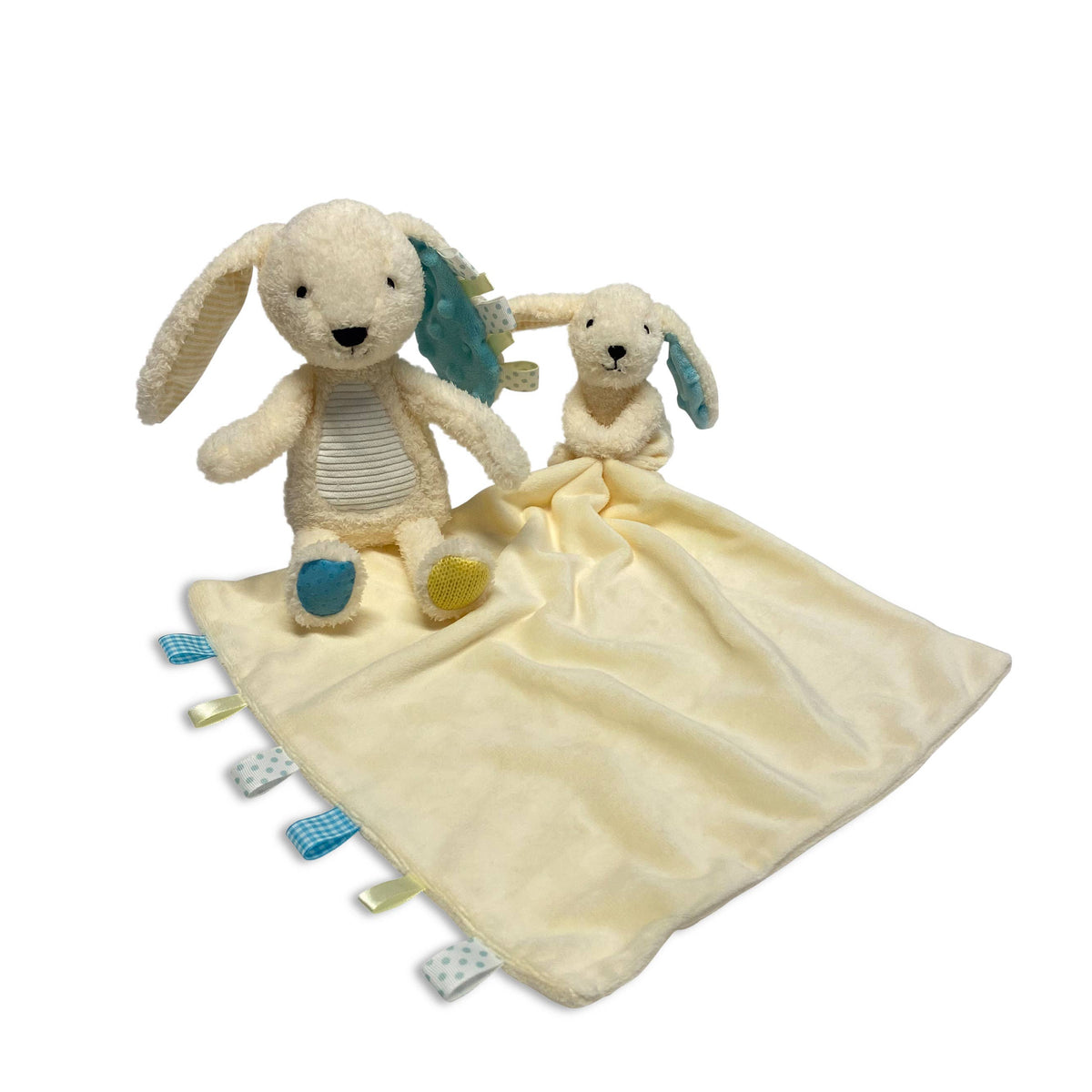 Two plush toys on a yellow blanket with tags on a white background