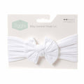 White baby headband with packaging displaying the Ziggle brand on a white background