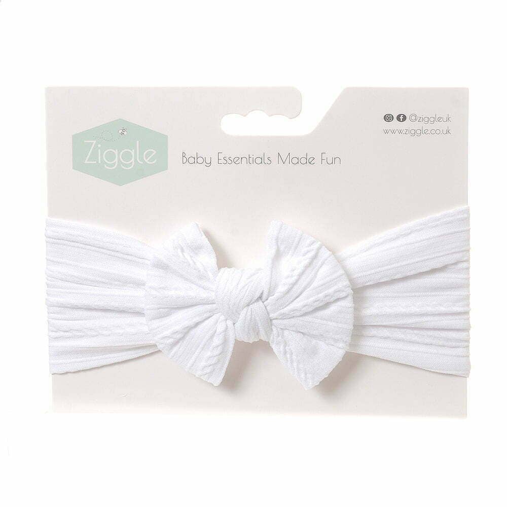 White baby headband with packaging displaying the Ziggle brand on a white background