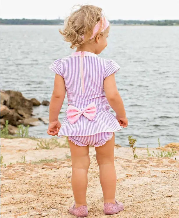 RUFFLEBUTTS RuffleButts Lilac Seersucker Peplum One Piece Bow Swimsuit -  Adorababy.co.uk
