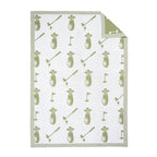 Golf-themed baby blanket with patterns of golf bags, clubs, and flags on a white background