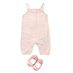 Pink baby romper with matching shoes on a white background | Adorababy