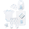 Baby clothing set with onesie, pants, bib, hat, and plush toy on a white background