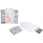 Dalmation dotty print Baby folding changing mat with packaging on a white background