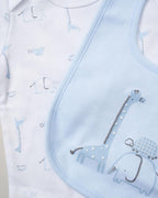 Baby outfit with blue bib and white shirt featuring animal prints on a light background
