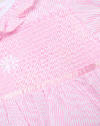 Close-up of pink ruffle baby romper - Adorababy.co.uk