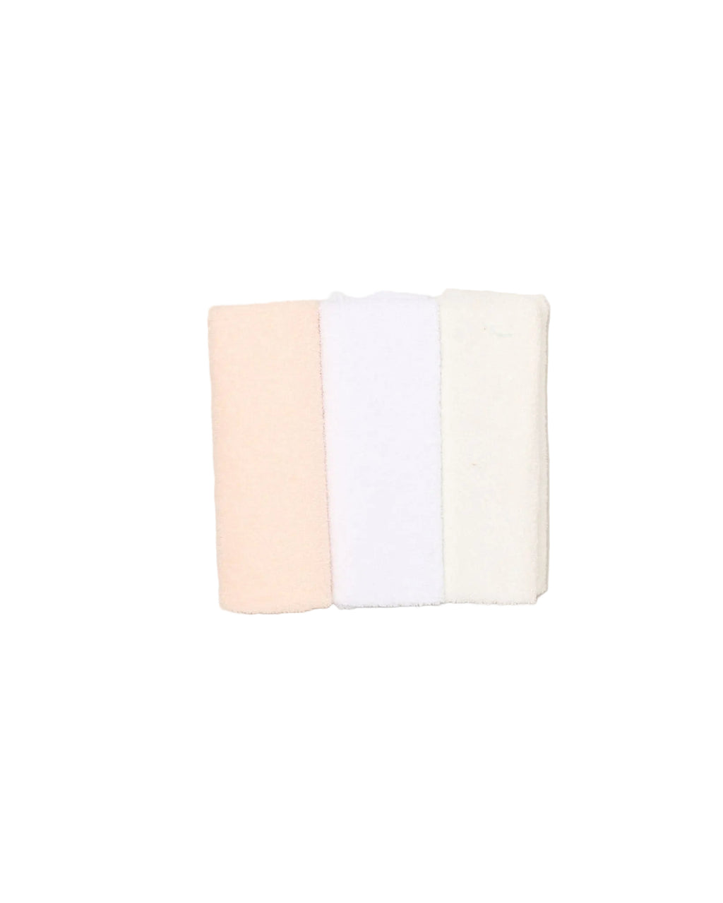 Three folded towels in beige, white, and pink on a light beige background