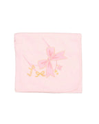 Pink baby blanket with bow and text on a light gray background