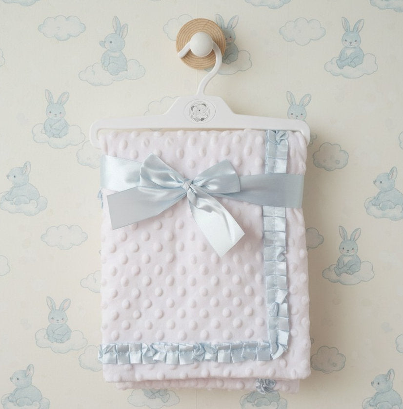 white dimpled baby blanket with sky blue satin trim - adorababy.co.uk