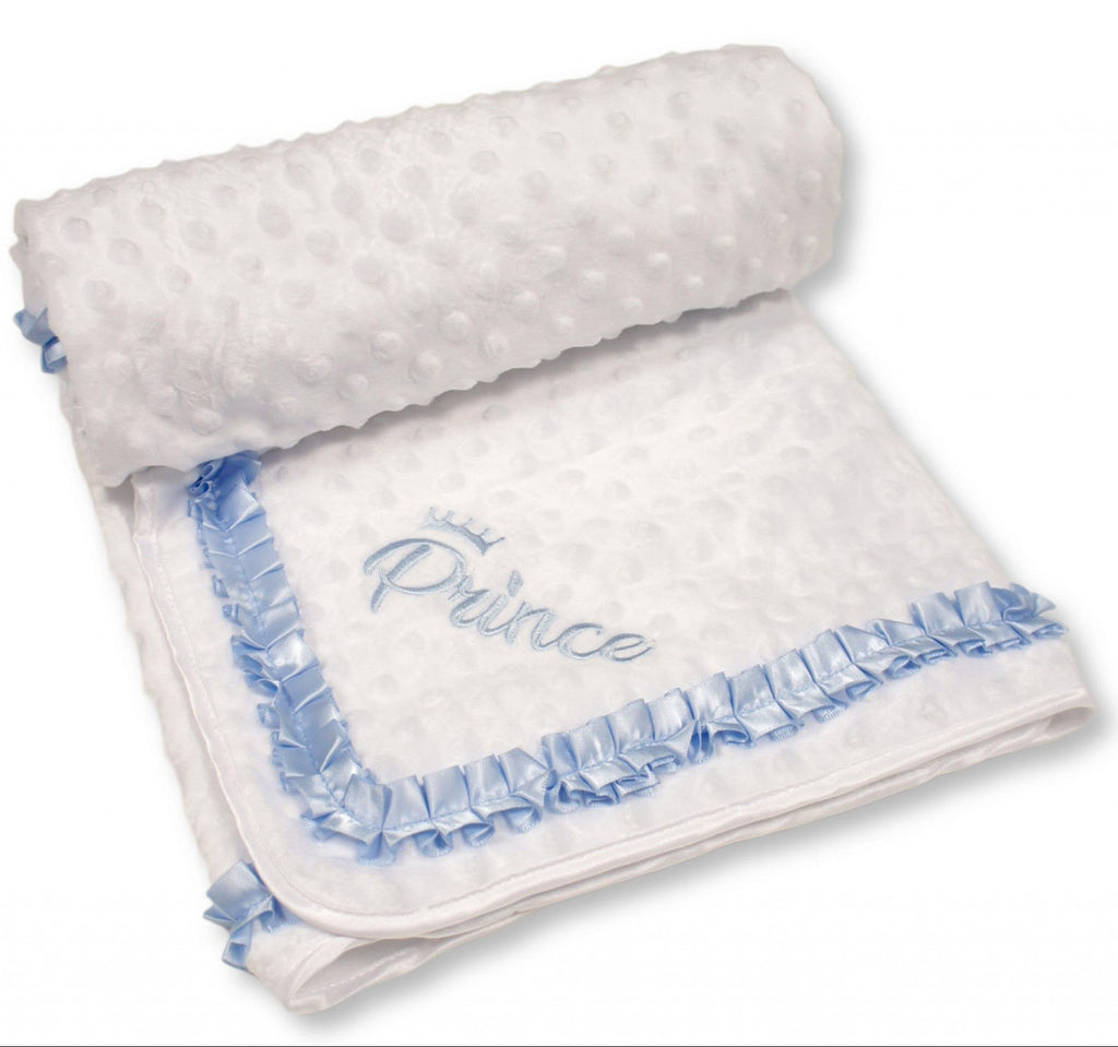 White baby blanket with blue ruffle and 'Prince' embroidery on a white background