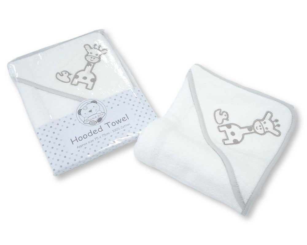 A white hooded baby towel with a gray giraffe applique, shown both folded with a branded paper band and laid flat on a white background.