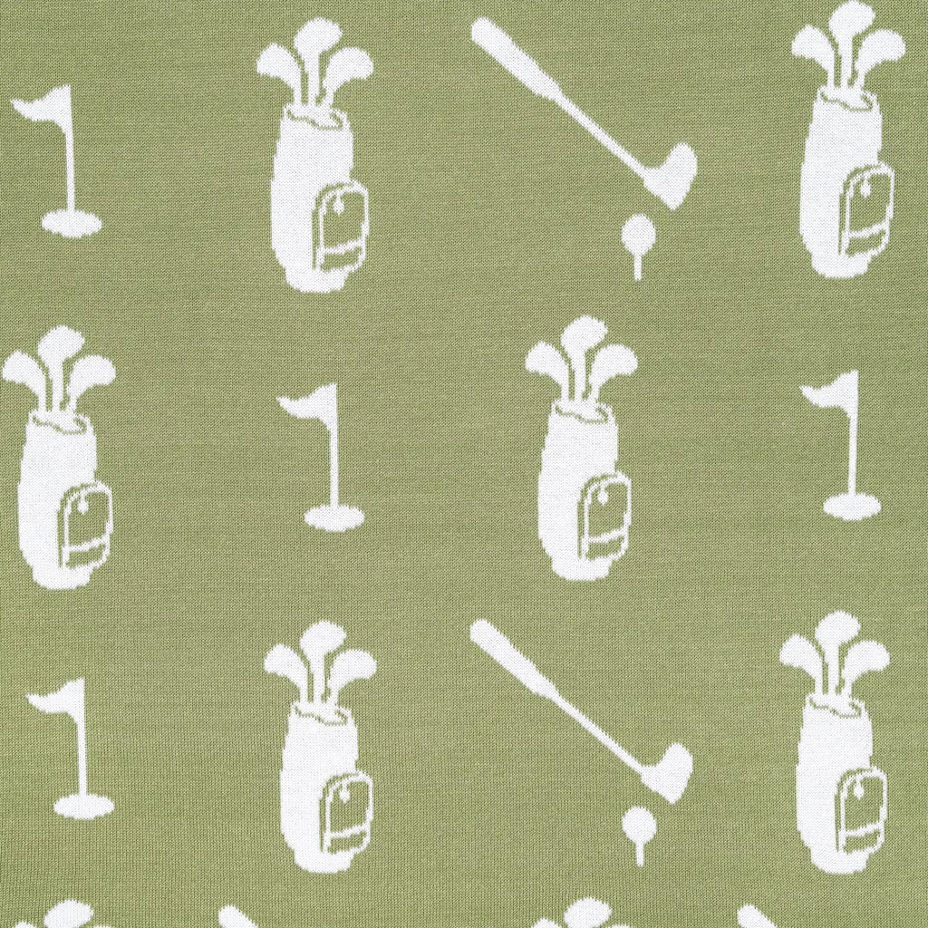 Pattern of golf-related items on a green background