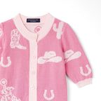Pink baby romper  with white cowgirl hat, boots and horses patterns on a white background = AdoraBaby.co.uk