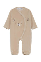 A baby's long-sleeve footed sleeper in a soft beige corduroy fabric, featuring an embroidered bear face on the chest.
