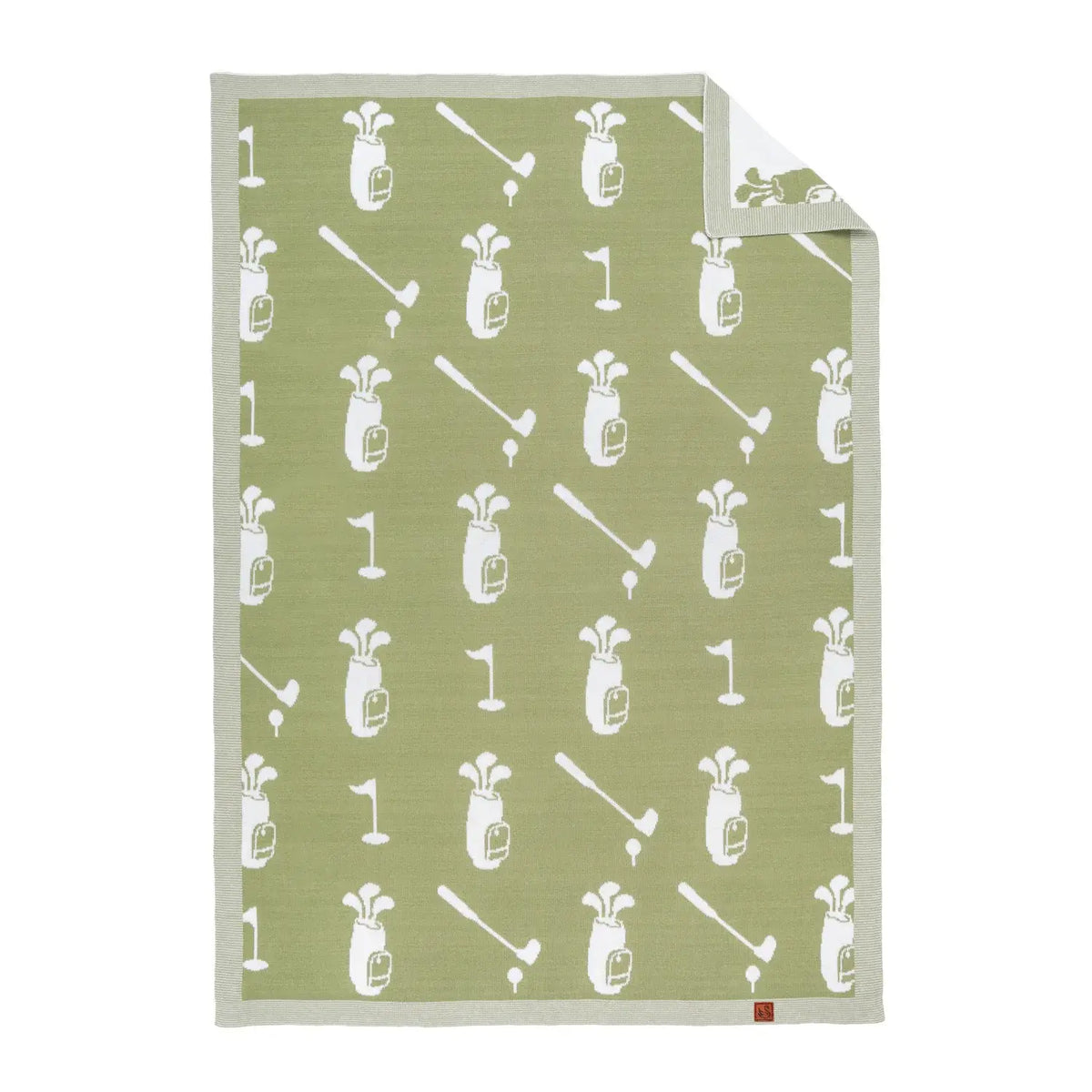 A rectangular golf-themed baby blanket with a sage green background and a white repeating pattern of golf bags, clubs, flags, and tees, shown on a plain white background with one corner folded over.